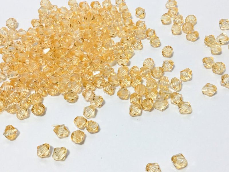画像1: ビーズクラブ アクリルビーズ あめ色 ダイヤカット 6mm 100個 プラスチックビーズ ソロバン型 そろばん型 多面カット 手芸 ハンドメイド パーツ (1)
